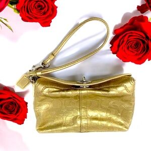 EUC COACH LEGACY METALIC GOLD LEATHER
SIGNATURE TURN LOCK WRISTLET